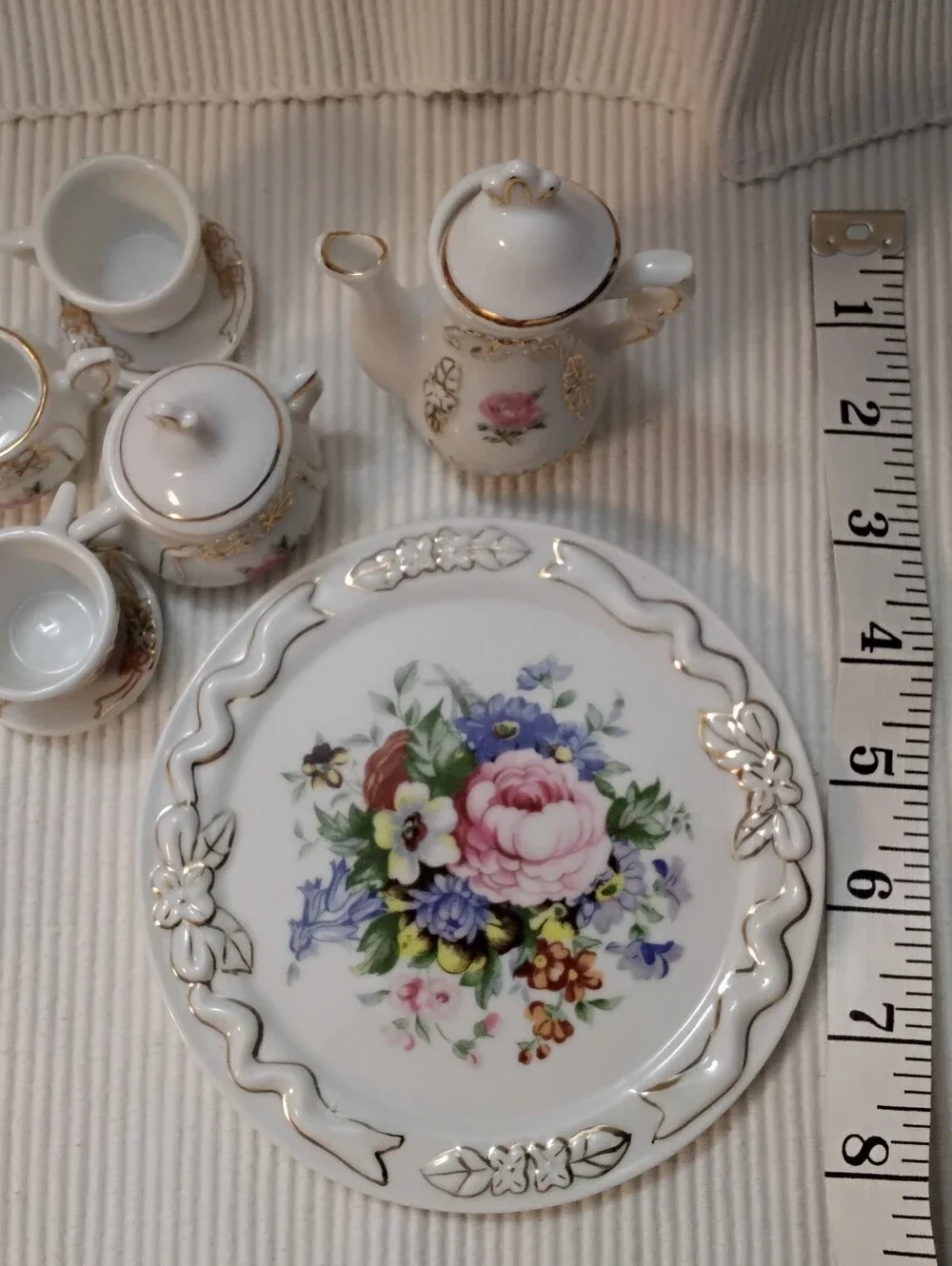 4028 Vintage Porcelain 10 Piece Tiny Tea  Set Floral Plate with Gold Trim.